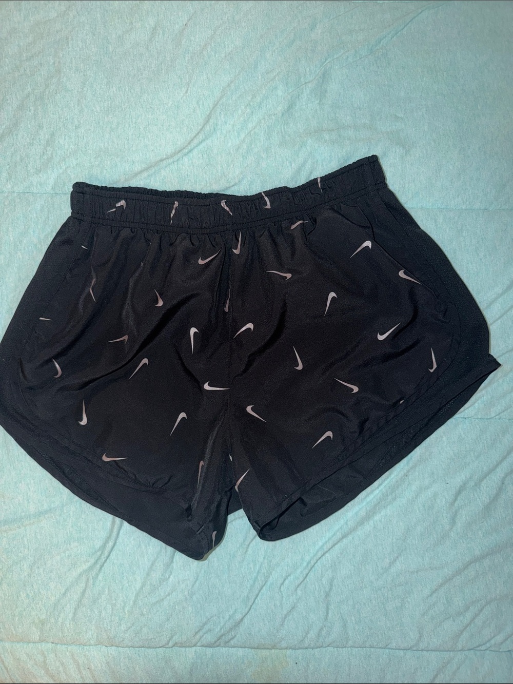 Nike Black Athletic Shorts with White Swoosh Print